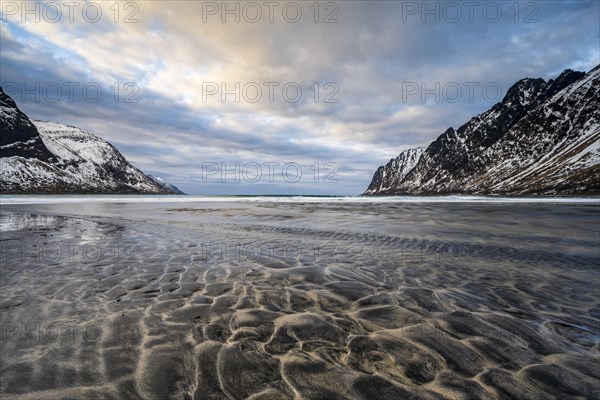 Sandy beach beach with mountains