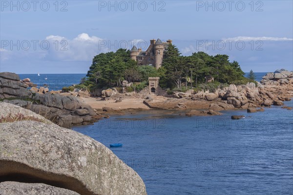 Rocky coast and Costaeres Island with Costaeres Castle