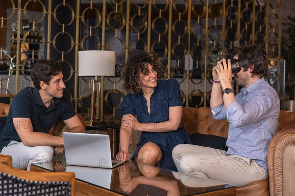 Business people selling a project with virtual reality goggles in a meeting