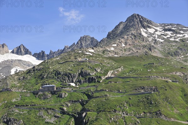 Winding road with hairpin curves over the Furka Pass in the Swiss Alps