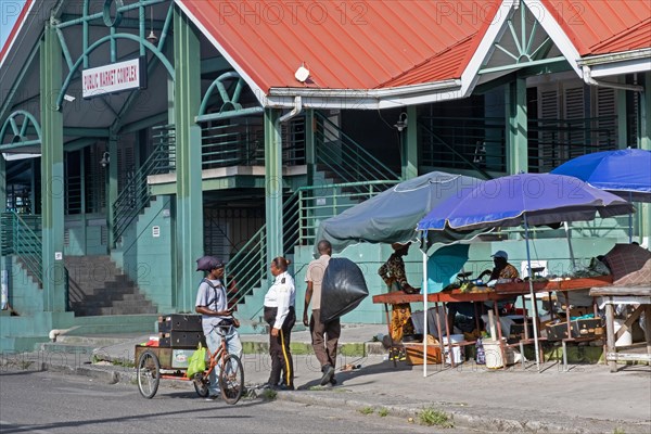 Street scene with police woman at St. John's