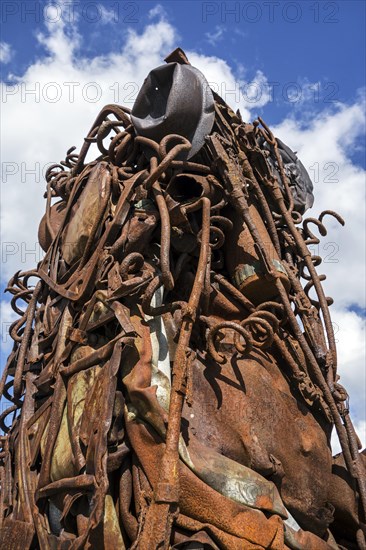 Compressed and twisted metal of WWI remnants like rifles