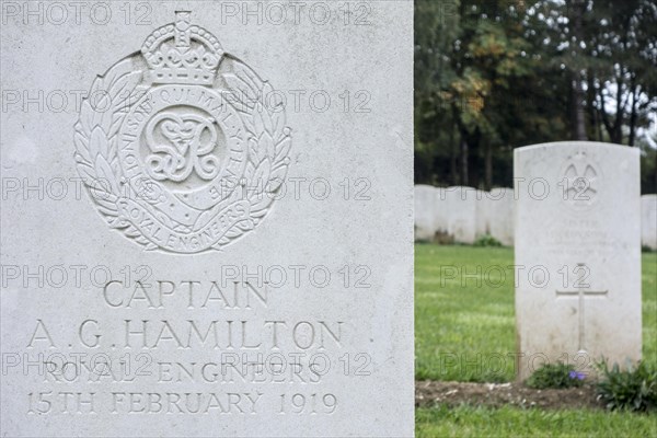 Royal Engineers regimental badge on headstone at Cemetery of the Commonwealth War Graves Commission for First World War One British soldiers