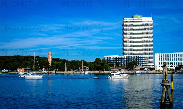 Maritim Hotel in Travemuende with the River Trave and pleasure boats. Hanseatic City of Luebeck