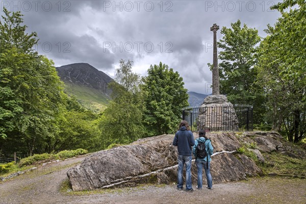 Monument with Celtic cross commemorating the Massacre of the Clan MacDonald of Glencoe in 1692