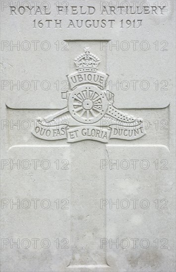 Royal Field Artillery regimental badge on headstone at Cemetery of the Commonwealth War Graves Commission for First World War One British soldiers