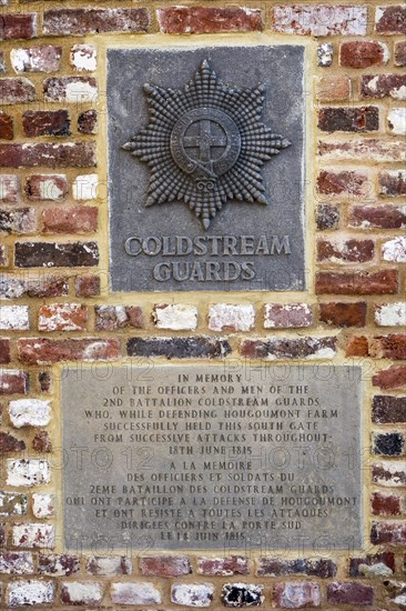 Memorial plaque to the Coldstream Guards at the south gate of the Chateau d'Hougoumont