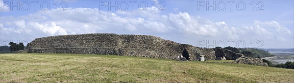 Tourists visiting the Cairn of Barnenez