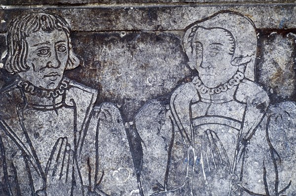 Mediaeval figures on stone tablet at the Gruuthuse museum