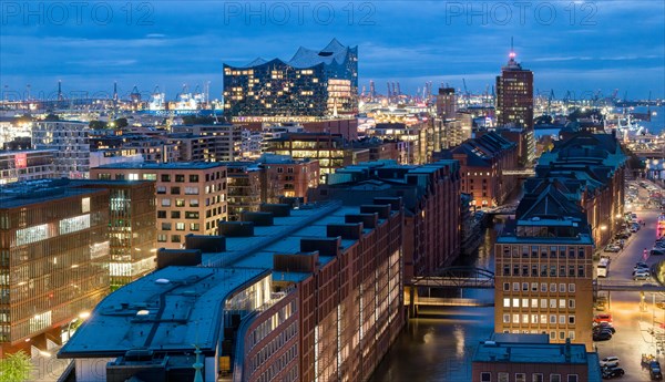 Aerial view of Speicherstadt Hamburg at Brooksfleet with Elbe Philharmonic Hall at blue hour