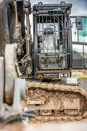 Black Liebherr crawler excavator recycling on demolition site