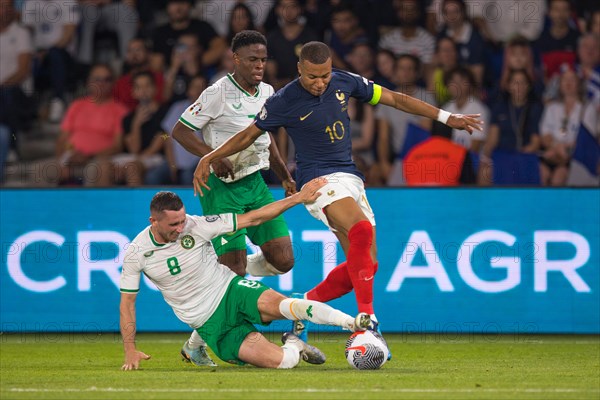 Alan BROWNE Ireland left brakes Kylian MBAPPE France