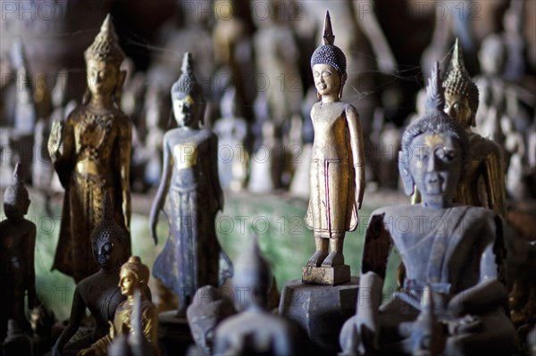 Buddha statues inside the lower cave