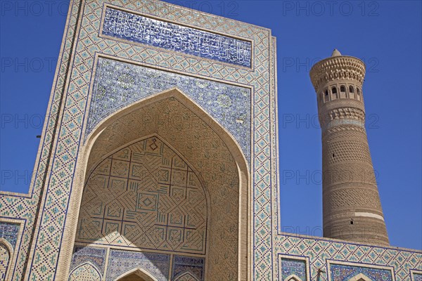Tiled Iwan portal and minaret of the Kalyan Mosque