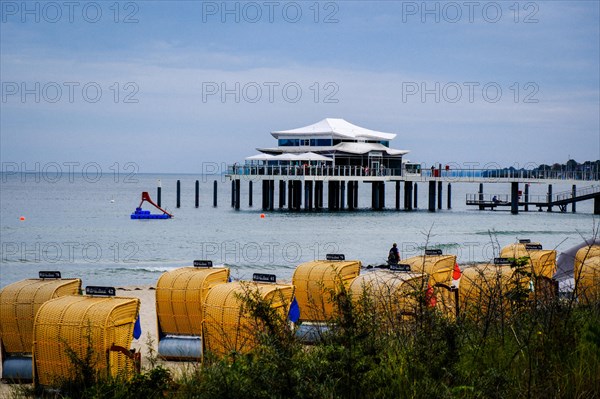 Pier in Timmendorf on the Baltic Sea with gastronomy. Hanseatic City of Luebeck