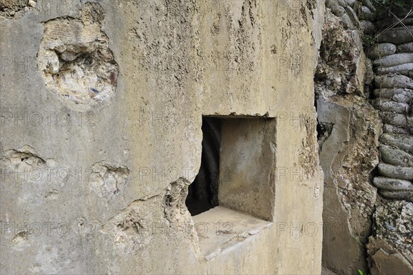 Bullet holes in one of the four British bunkers as headquarters on the Lettenberg