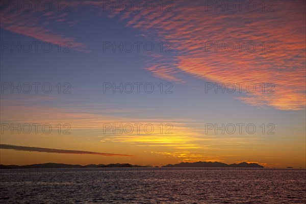 Mackerel sunset over the Whitsunday Islands in the Coral Sea