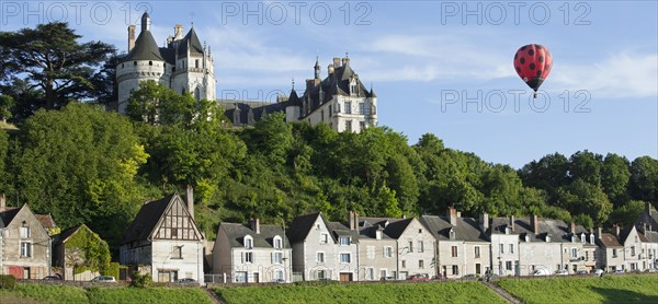 Hot-air balloon flying over the Chateau de Chaumont