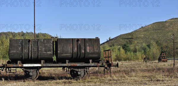 Wagon and abandoned spoil tip of the coal mine at Beringen