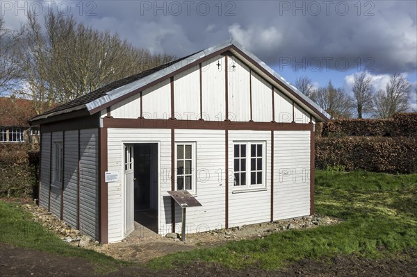 Wooden barrack used as prefabricated temporary house for First World War One civilian victims reconstructed near the IJzertoren