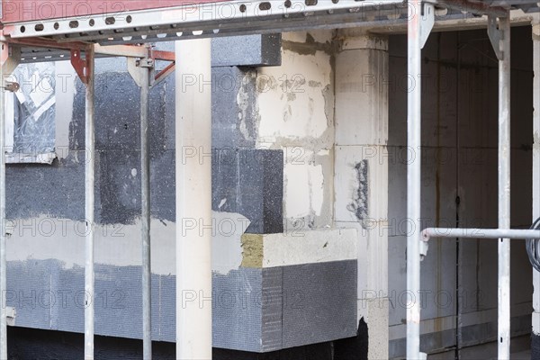 Insulation of a facade of a new building with Polystorol boards in Duesseldorf