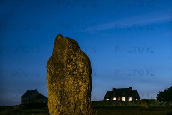 Megalithic standing stone at the Alignements de Lagatjar at night