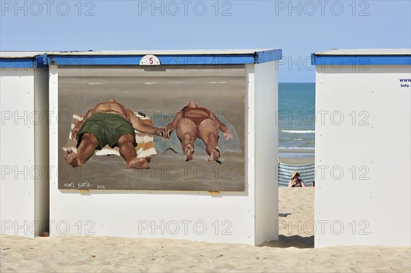 Wall painting of sunbathers on beach cabin along the North Sea coast at Koksijde