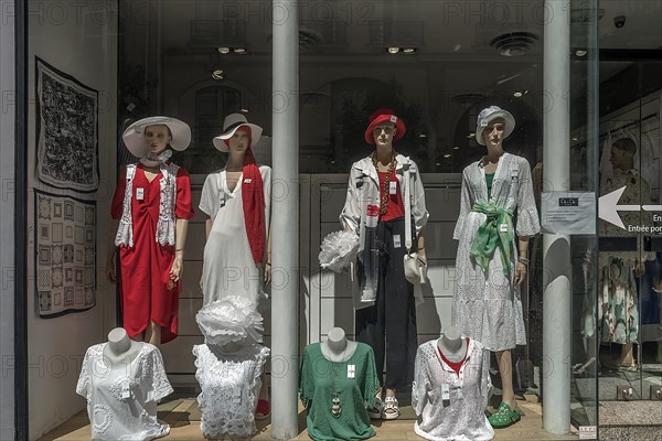 Summer dressed mannequins of a fashion shop