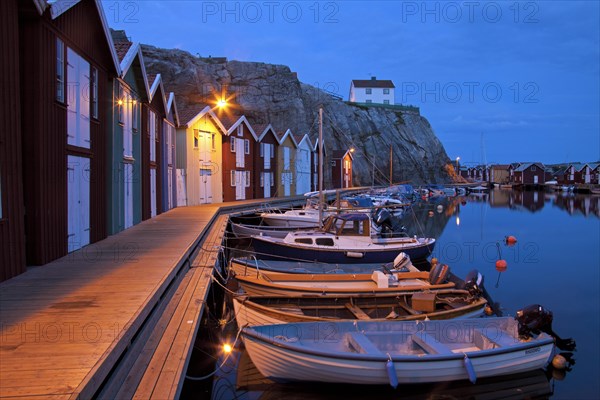 Wooden fishing huts in the village Smoegen