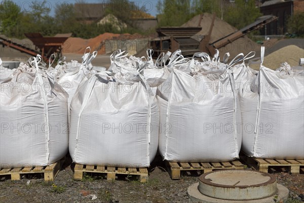 White bags with pebbles