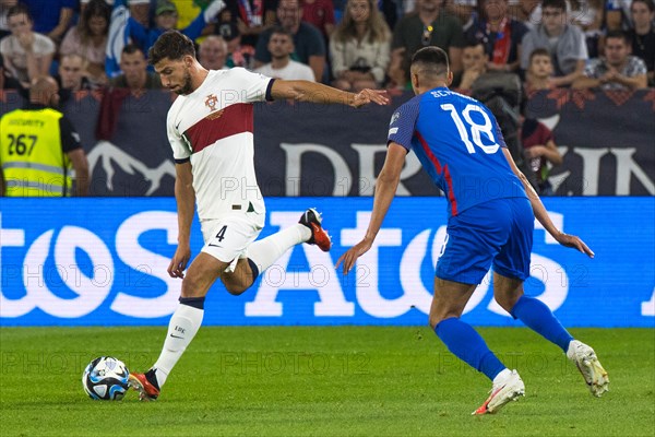 Ruben Alves DIAS Portugal left in a duel with Ivan SCHRANZ Slovakia