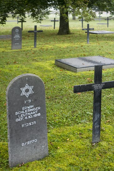 Jewish headstone amongst graves of German soldiers at the First Wolrd War One Deutscher Soldatenfriedhof Consenvoye