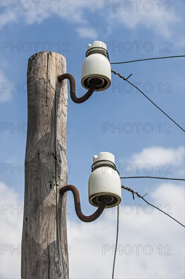 Porcelain pin insulators from Wire of Death