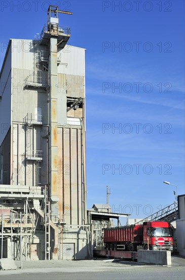 Truck on weighbridge at porphyry quarry