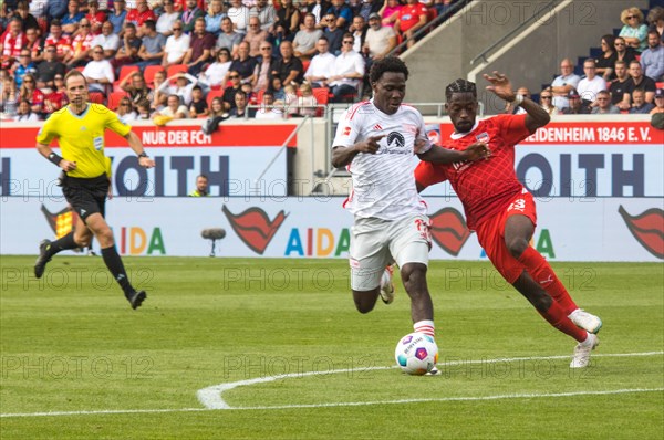Omar TRAORE 1.FC Heidenheim right in duel with David Datro FOFANA Union Berlin