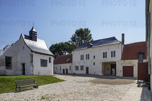 Courtyard showing chapel and gardener s house of the Chateau d'Hougoumont