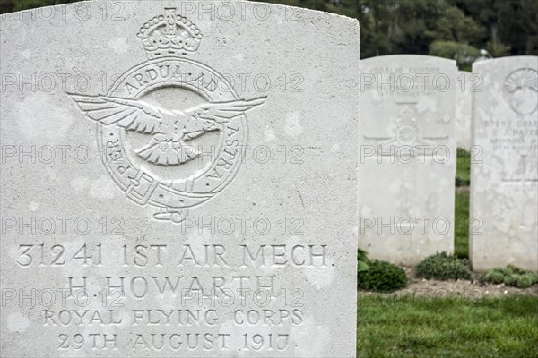 Royal Flying Corps regimental badge on headstone at Cemetery of the Commonwealth War Graves Commission for First World War One British soldiers