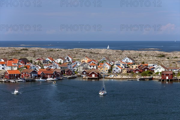 Wooden fishing huts in the village Smoegen