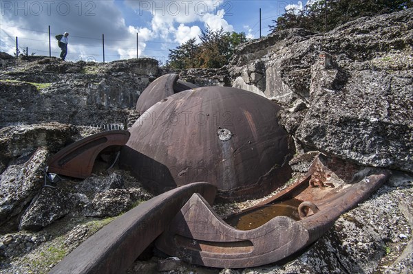 Broken gun turret and debris of the exploded magazine in the Fort de Loncin