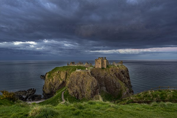 Menacing dark clouds above Dunnottar Castle