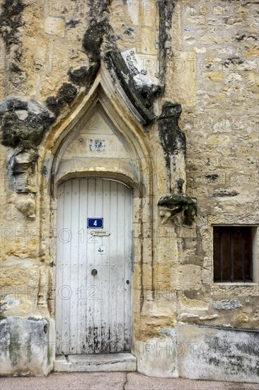 Medieval doorway in flamboyant Gothic style of the Ancienne Chambre des Comptes