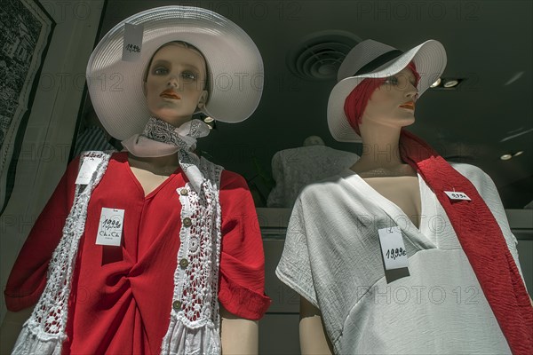 Summer dressed mannequins of a fashion shop