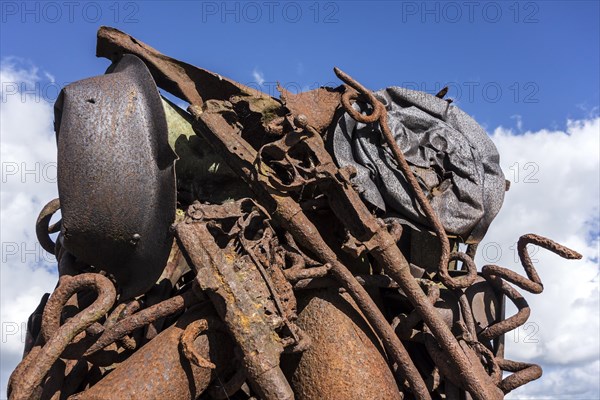 Compressed and twisted metal of WWI remnants like rifles