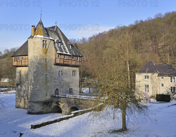 13th Century keep of Castle Carondelet at Crupet in the snow in winter