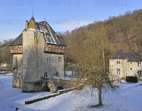 13th Century keep of Castle Carondelet at Crupet in the snow in winter