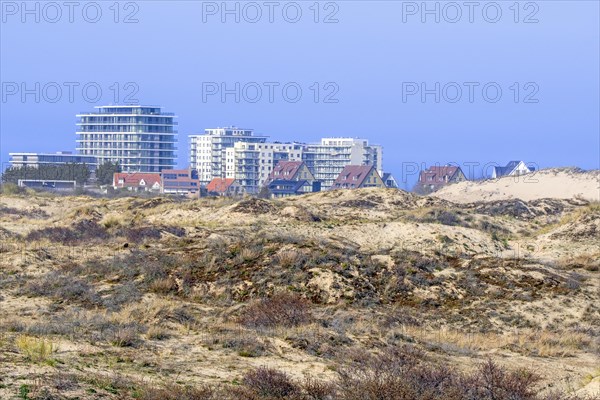 Flats and villas of seaside resort De Panne behind the sand dunes of nature reserve De Westhoek