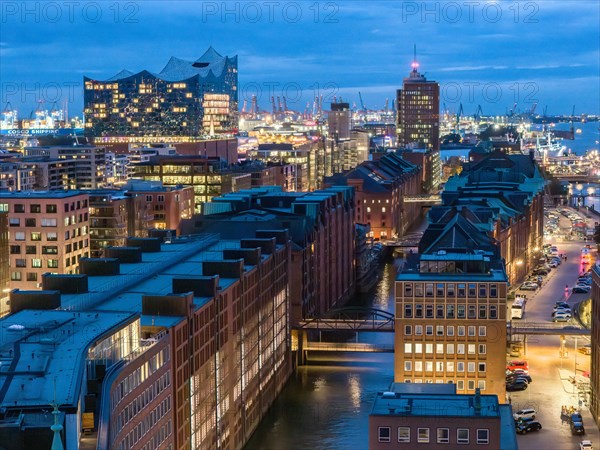 Aerial view of Speicherstadt Hamburg at Brooksfleet with Elbe Philharmonic Hall at blue hour