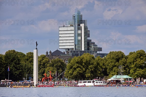 Dragonboat race on the artificial lake Maschsee and the Norddeutsche Landesbank in the background