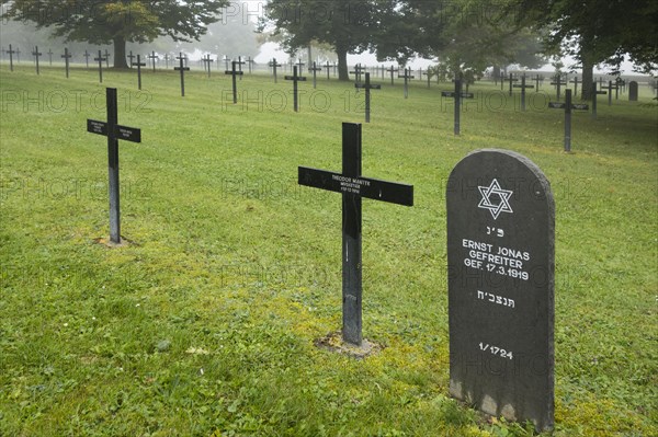 Jewish headstone amongst graves of German soldiers at the First Wolrd War One Deutscher Soldatenfriedhof Consenvoye