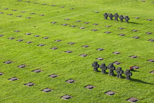 Tombstones and stone crosses at La Cambe German Second World War military cemetery